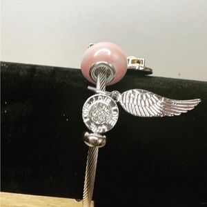 Pink charmed Clasp bracelet brand new